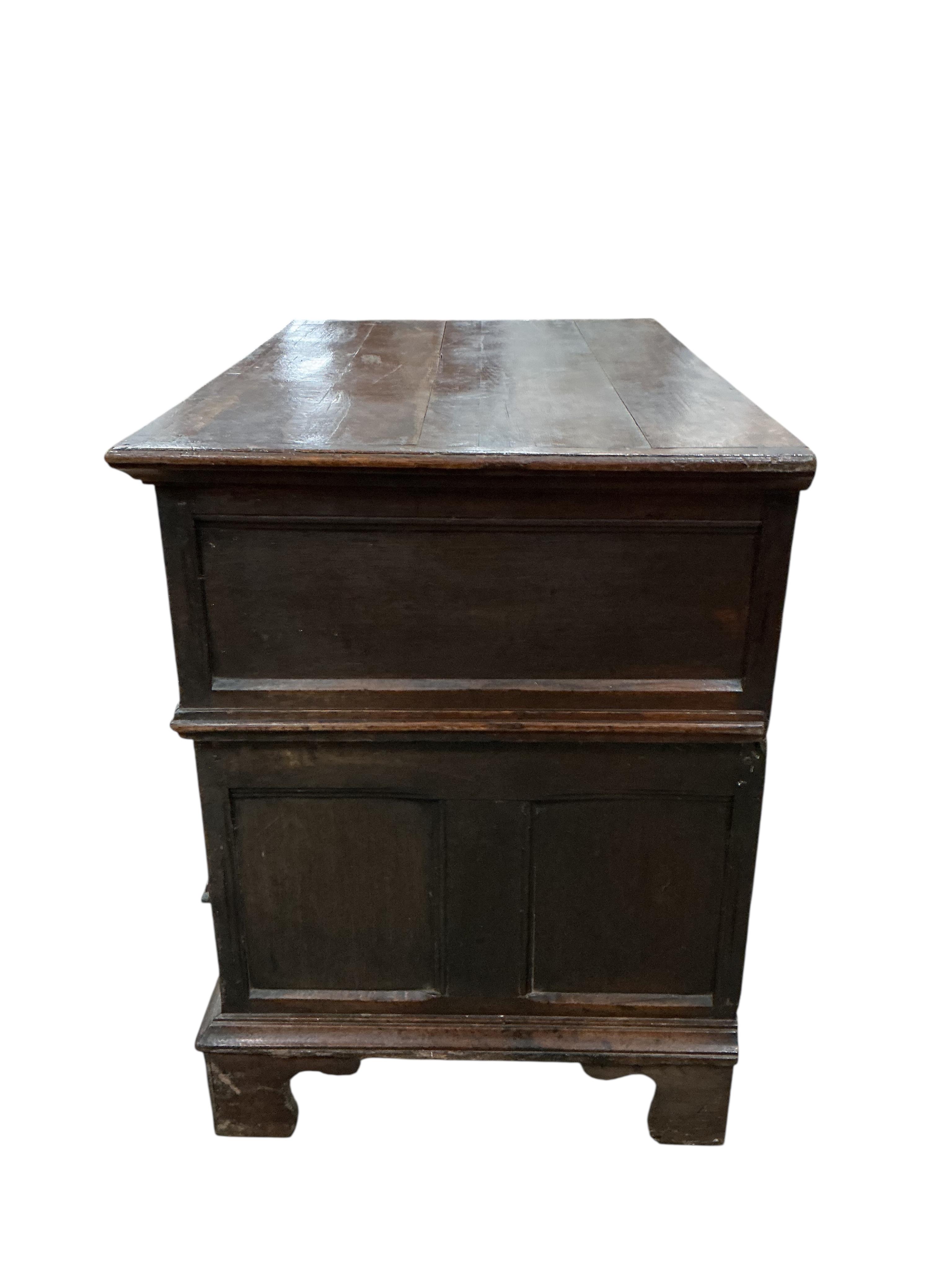 A William and Mary oak two part chest, width 108cm, depth 69cm, height 93cm.